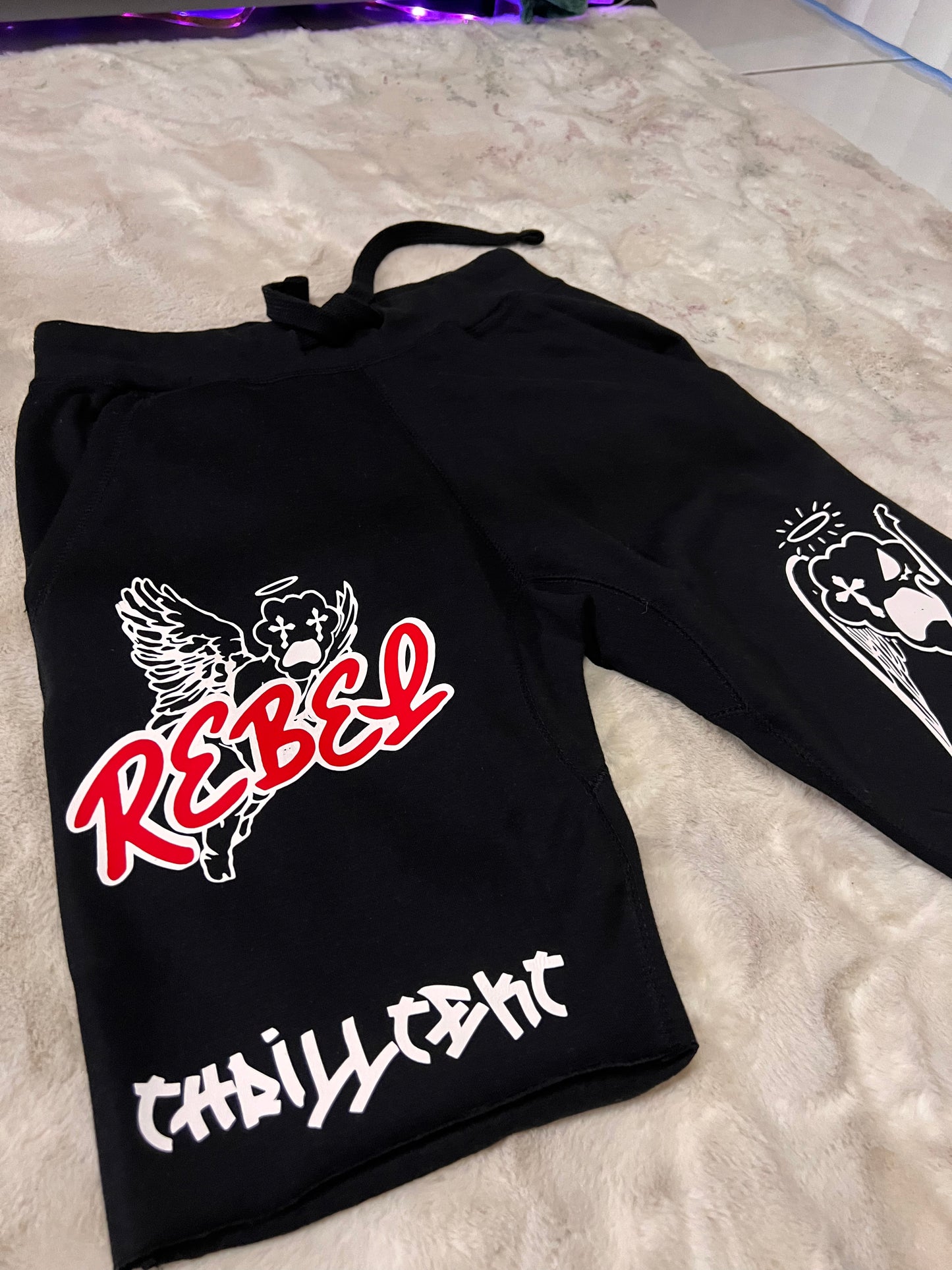 “Rebel Angels” Thrilltekt sweatshorts